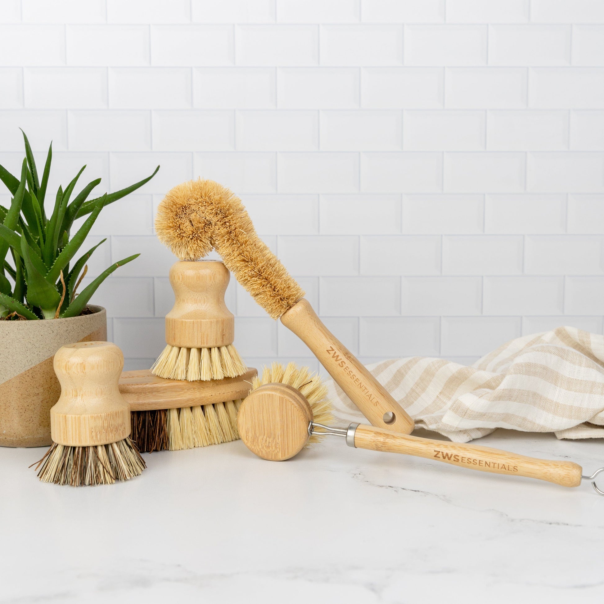 https://zwsessentials.com/cdn/shop/products/zws-essentials-zero-waste-dish-brush-kit-31615238275183.jpg?v=1678122410&width=1946